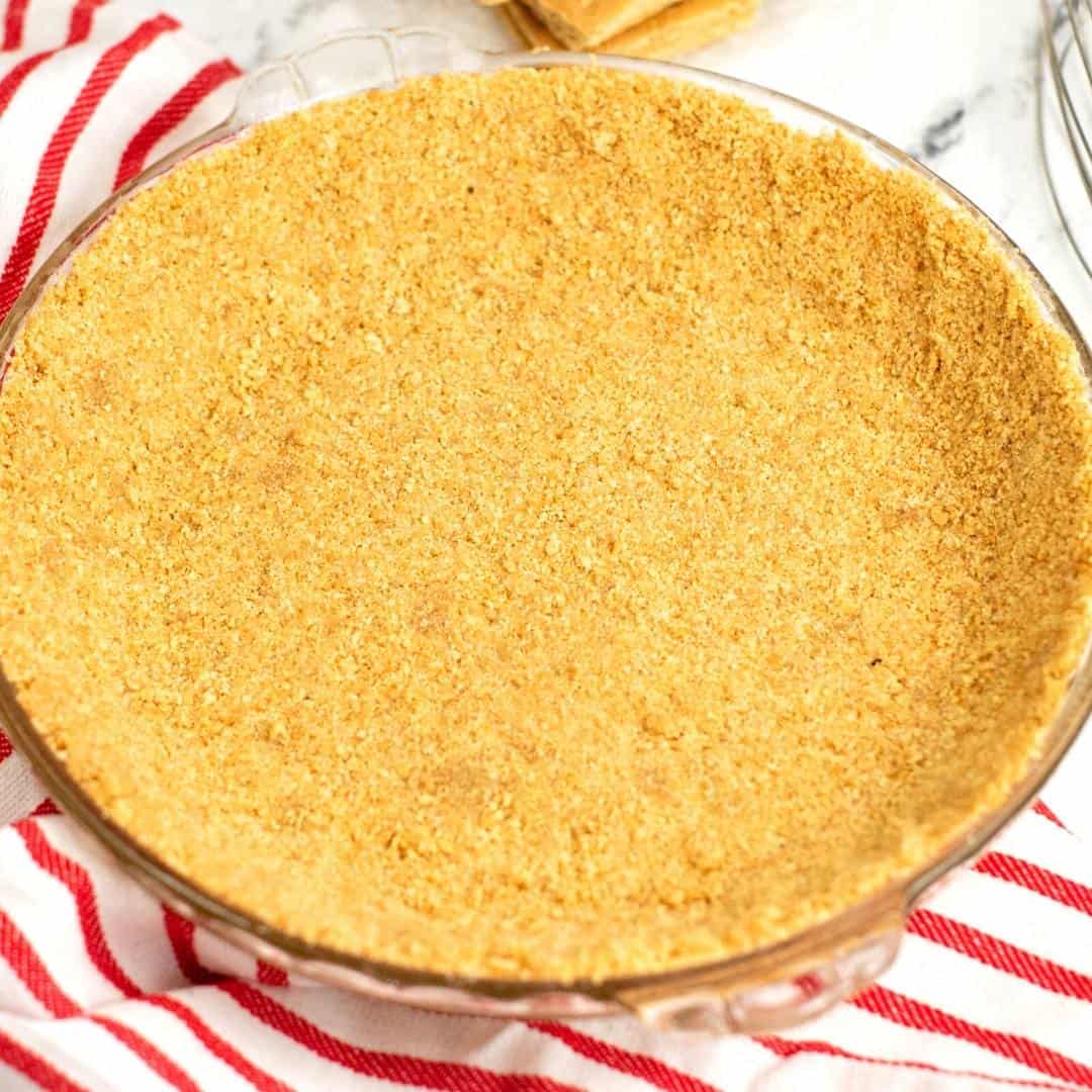 How to Make a Graham Cracker Pie Crust, a simple recipe for making a successful homemade graham cracker pie crust for desserts.