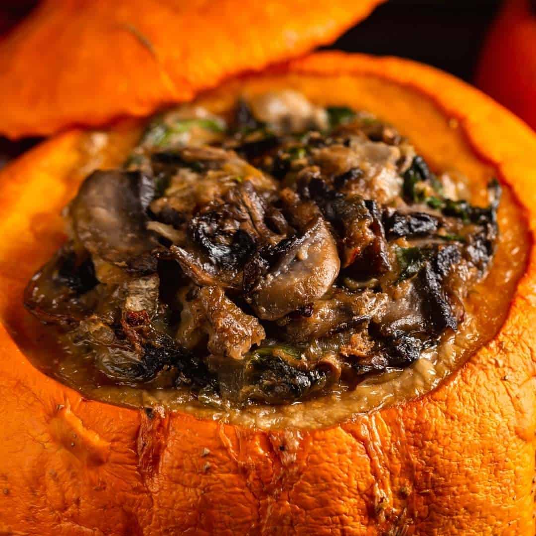 Savory Oven Baked Stuffed Pumpkin, a delicious fall inspired recipe idea that is perfect for Thanksgiving or Christmas holidays.