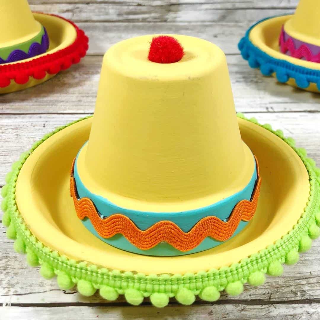 Clay Pot Sombrero Craft DIY, a simple homemade project for turning a terracotta clay pot into a hat for decor or garden use.