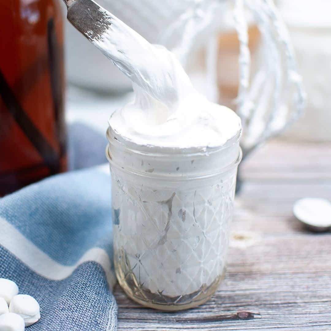 How to Make Marshmallow Fluff, a simple recipe for making a delicious sugary dessert topping for ice cream or filling for cakes.