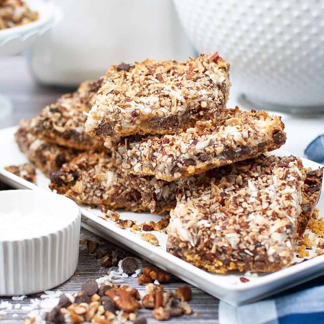 Easy Layered Magic Cookie Bars, a simple and delicious six ingredient dessert or snack recipe  baked in a single pan.