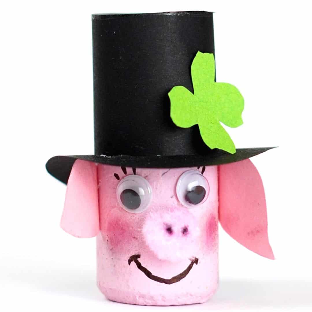 St. Patricks Day Wine Cork Craft DIY, a simple do it yourself craft idea for most ages for turning a cork into an adorable piggy.