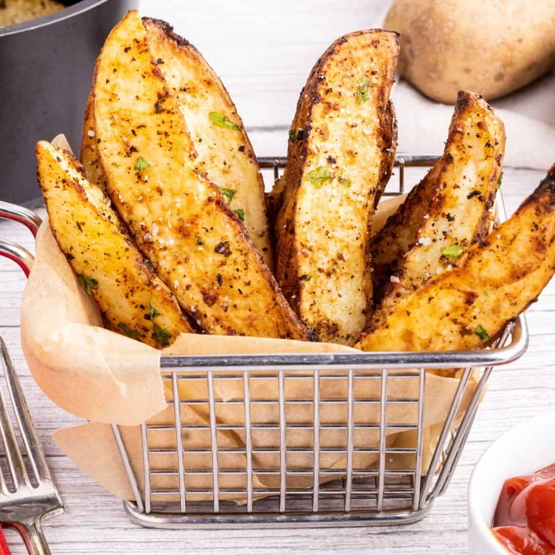 Air Fryer Crispy Potato Wedges, a simple and quick recipe for delicious seasoned flavorful fried potatoes made with no oil.