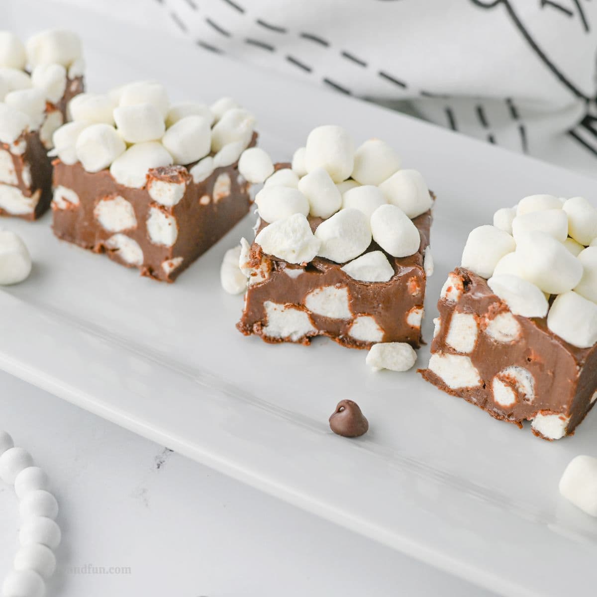 Hot Chocolate Fudge Recipe, an easy and decadent no-bake recipe made with hot chocolate mix and marshmallows. Hot Chocolate Fudge Recipe, an easy and decadent no-bake recipe made with hot chocolate mix and marshmallows.