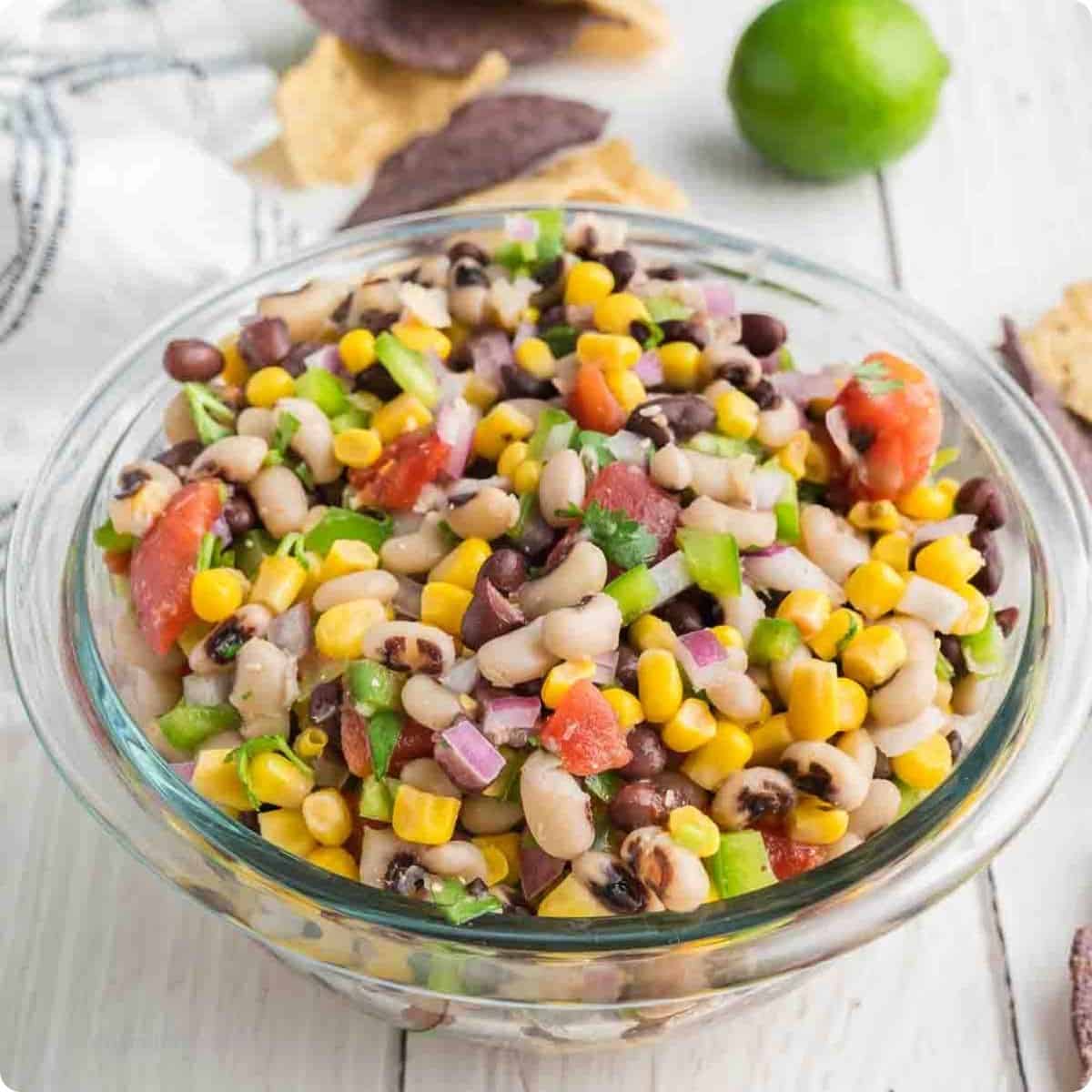 5 Minute Cowboy Caviar Recipe, aka Texas Caviar, is a simple and colorful bean salad, dip, or topping made vibrant and healthy ingredients. 5 Minute Cowboy Caviar Recipe, aka Texas Caviar, is a simple and colorful bean salad, dip, or topping made vibrant and healthy ingredients.