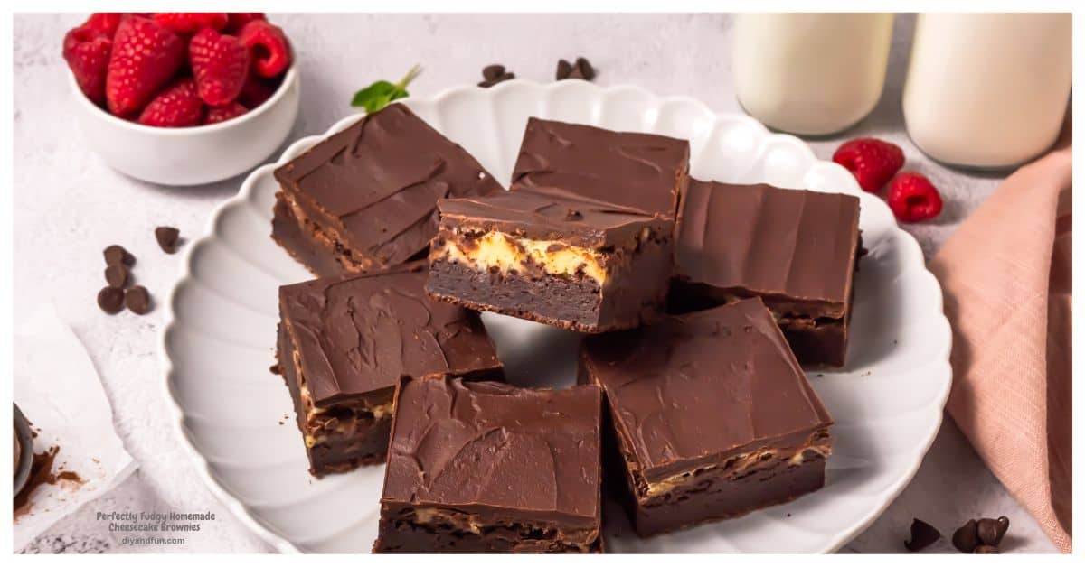 Perfectly Fudgy Homemade Cheesecake Brownies, a decadent, triple-layer dessert featuring a cheesecake center topped with chocolate ganache. Perfectly Fudgy Homemade Cheesecake Brownies, a decadent, triple-layer dessert featuring a cheesecake center topped with chocolate ganache.