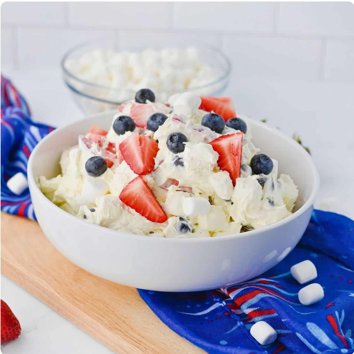 Red White and Blue Cheesecake Salad is an Easy 15-Minute Recipe for the ultimate creamy summer dessert made with fresh berries. Red White and Blue Cheesecake Salad is an Easy 15-Minute Recipe for the ultimate creamy summer dessert made with fresh berries.