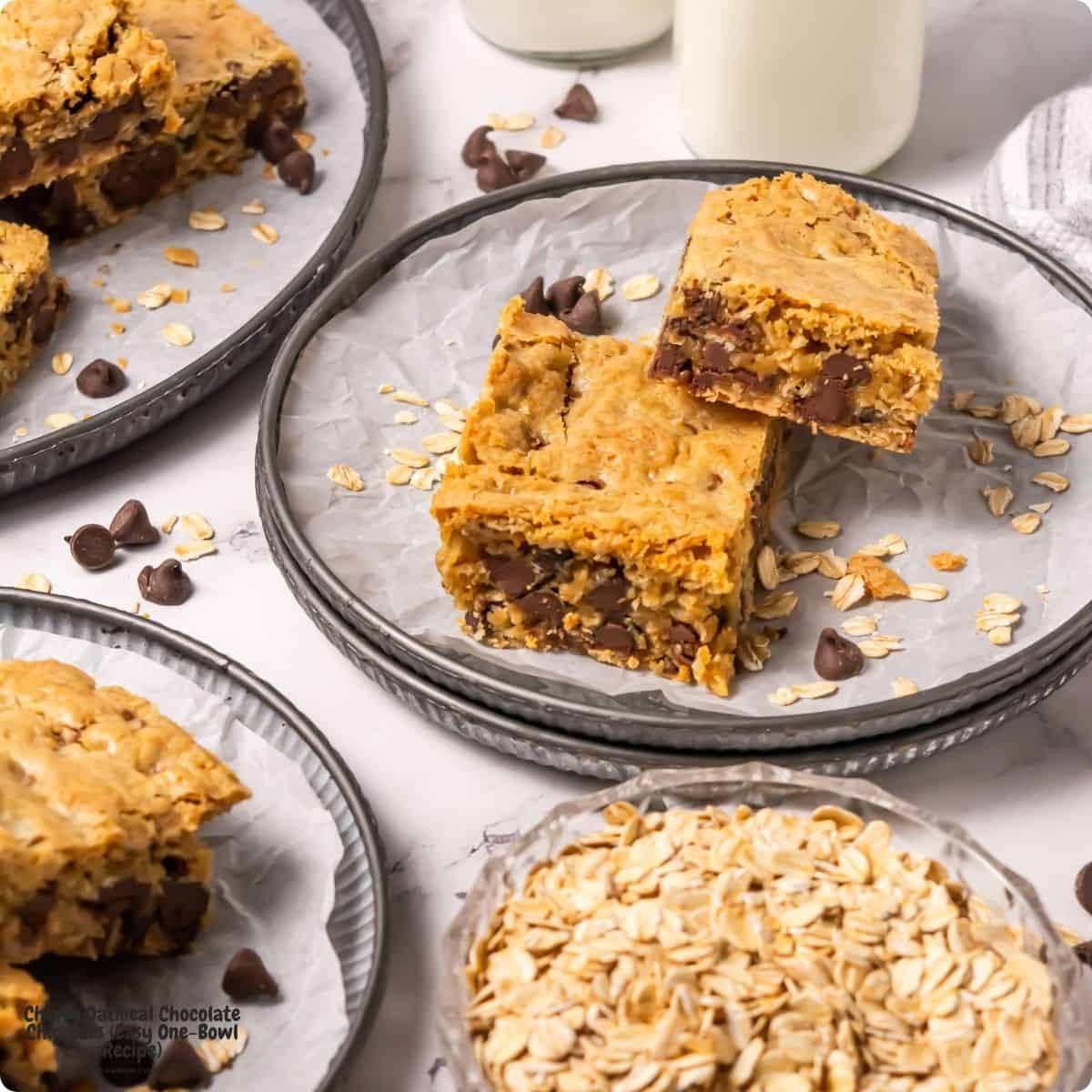 Chewy Oatmeal Chocolate Chip Bars is an Easy One-Bowl Recipe combining the hearty chew of a classic cookie with the ease of a one-pan bake. Chewy Oatmeal Chocolate Chip Bars is an Easy One-Bowl Recipe combining the hearty chew of a classic cookie with the ease of a one-pan bake.