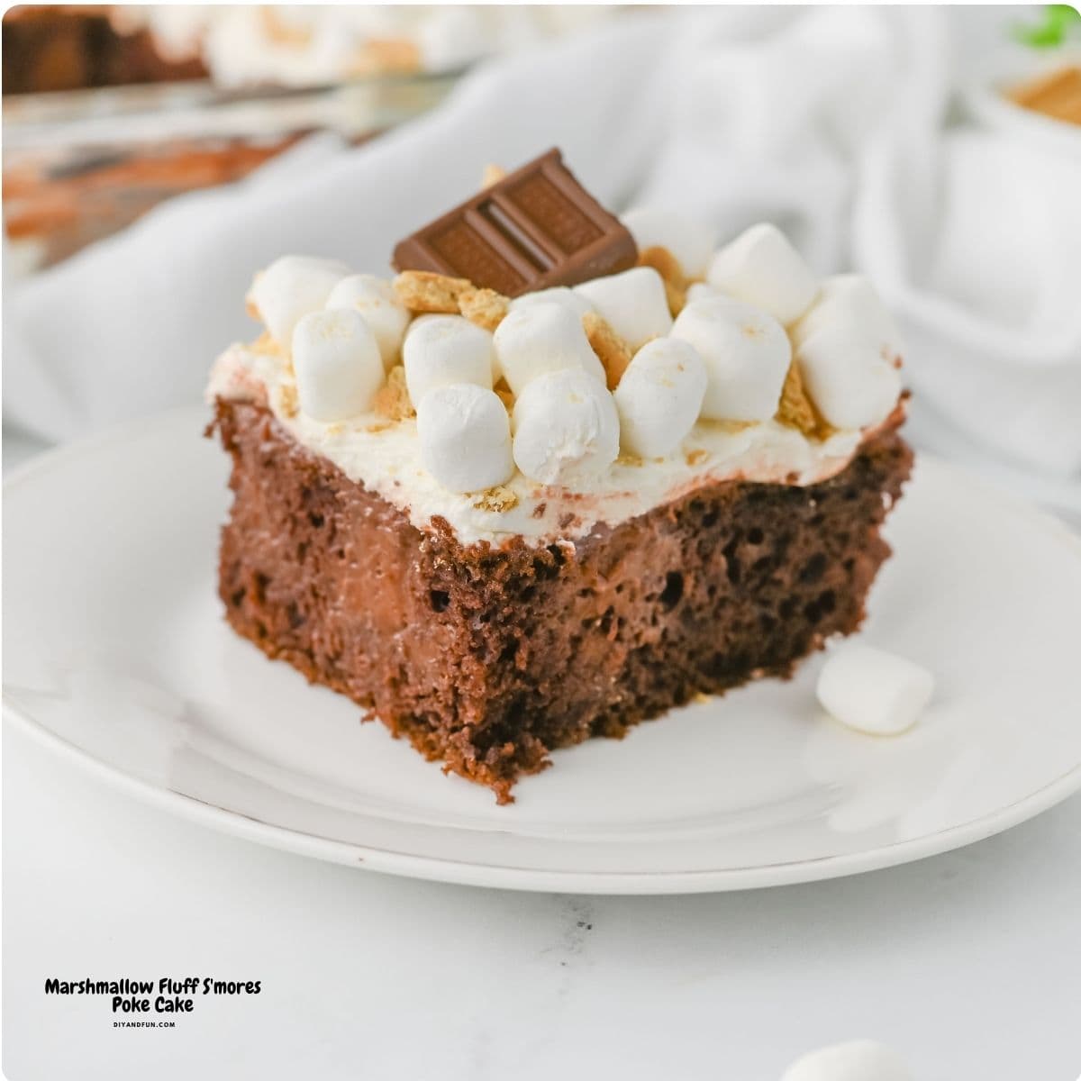 Marshmallow Fluff S'mores Poke Cake, the ultimate easy dessert made with chocolate cake, rich pudding, and fluffy frosting. Marshmallow Fluff S'mores Poke Cake, the ultimate easy dessert made with chocolate cake, rich pudding, and fluffy frosting.
