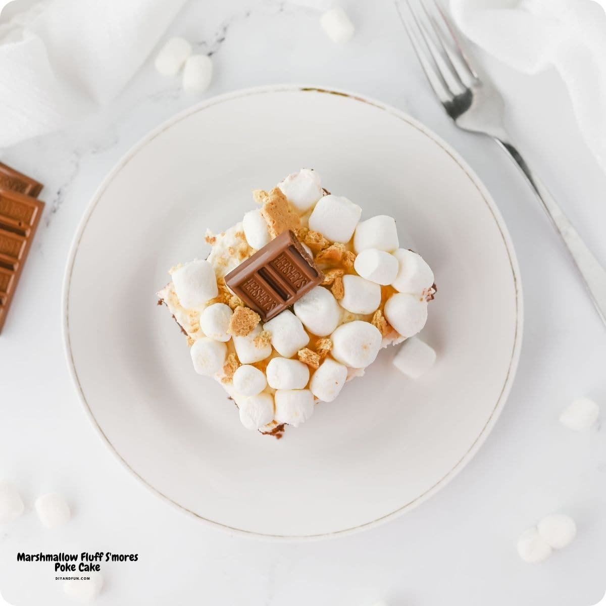 Marshmallow Fluff S'mores Poke Cake, the ultimate easy dessert made with chocolate cake, rich pudding, and fluffy frosting. Marshmallow Fluff S'mores Poke Cake, the ultimate easy dessert made with chocolate cake, rich pudding, and fluffy frosting.