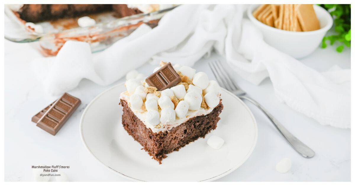 Marshmallow Fluff S'mores Poke Cake, the ultimate easy dessert made with chocolate cake, rich pudding, and fluffy frosting. Marshmallow Fluff S'mores Poke Cake